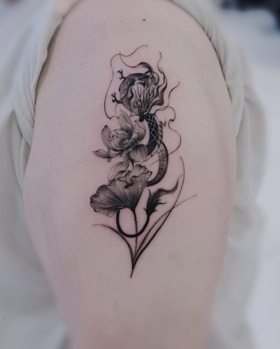 Tattoo by @mj_inkflow — black_and_grey, fine_line