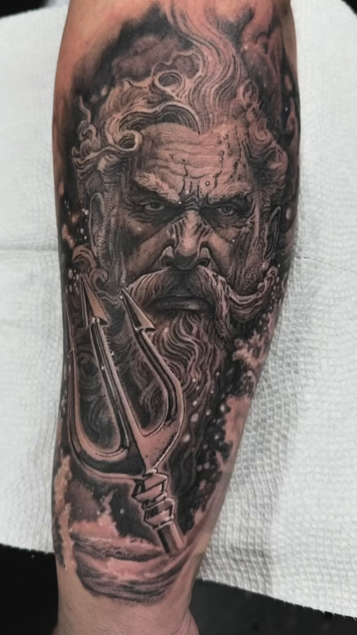 Greek god Poseidon realism tattoo by Michael Tovar