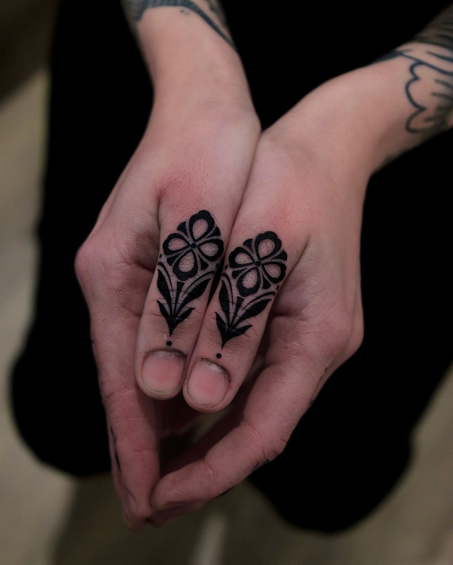Floral pattern black and grey tattoo on the hand by Seoul tattoo