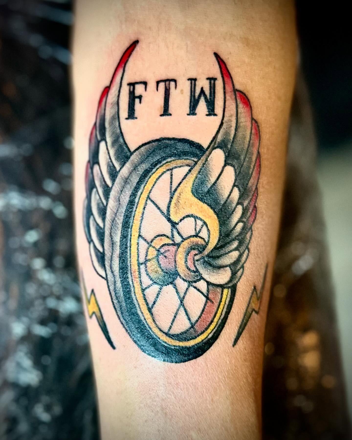 Wings and wheel American traditional tattoo on the forearm by Tattoo Artist Ian Day (Everlasting_Art_Ink)