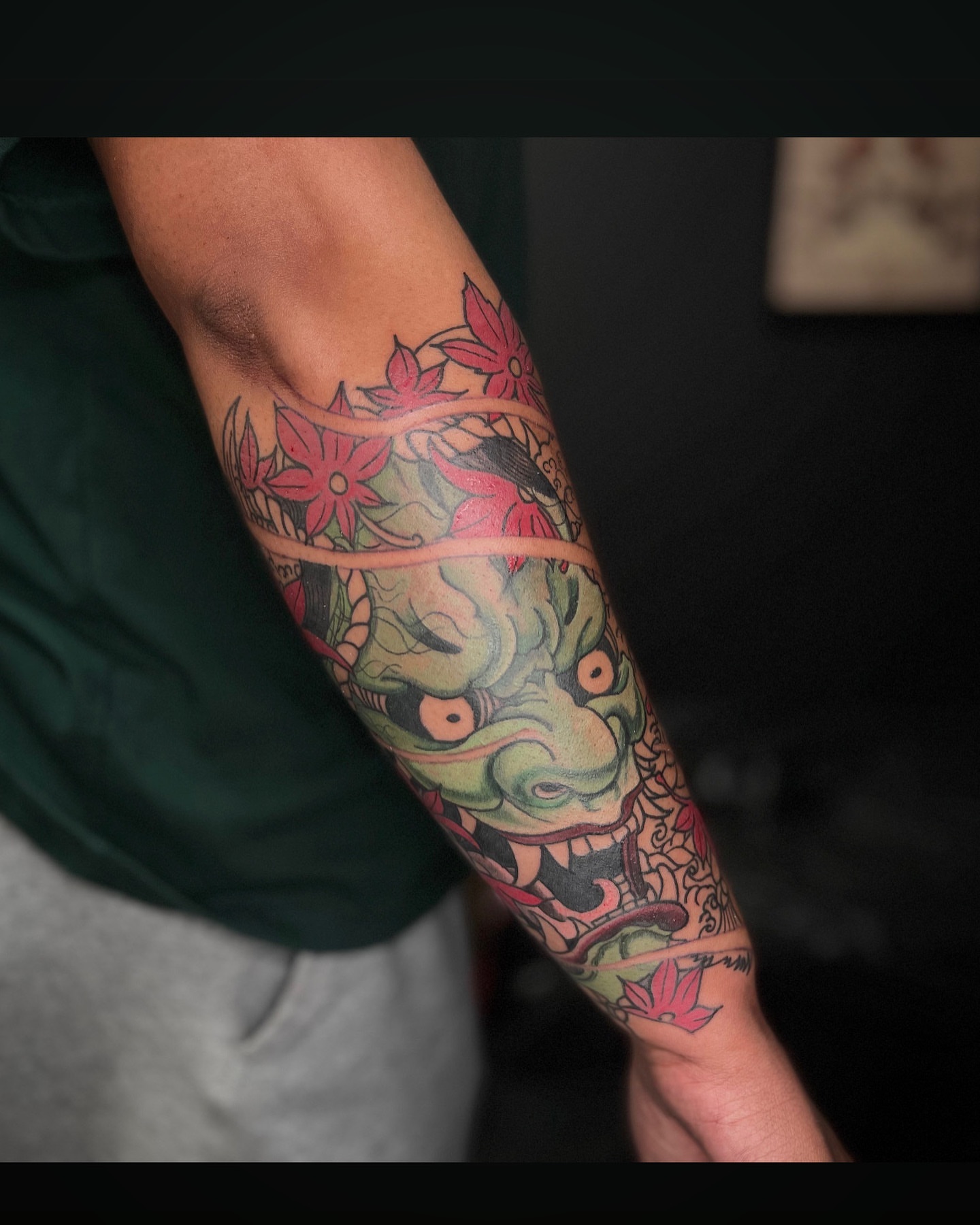 Japanese dragon American traditional tattoo on the forearm by Zack Yang, Houston, Texas