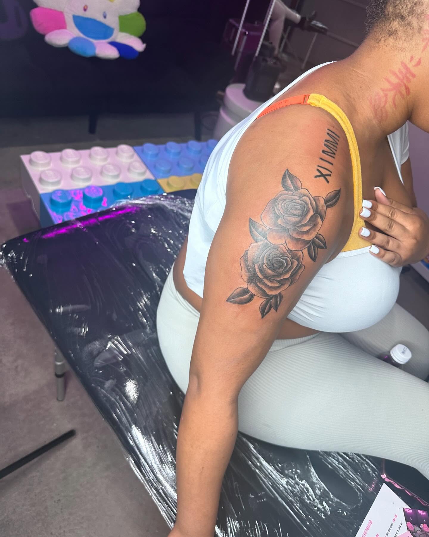 Roses black and grey tattoo on the shoulder by Sierra 🩷