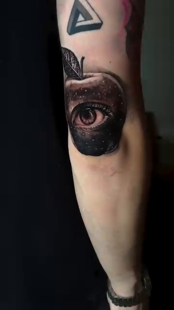 Apple with an eye realism tattoo by Abel Deida