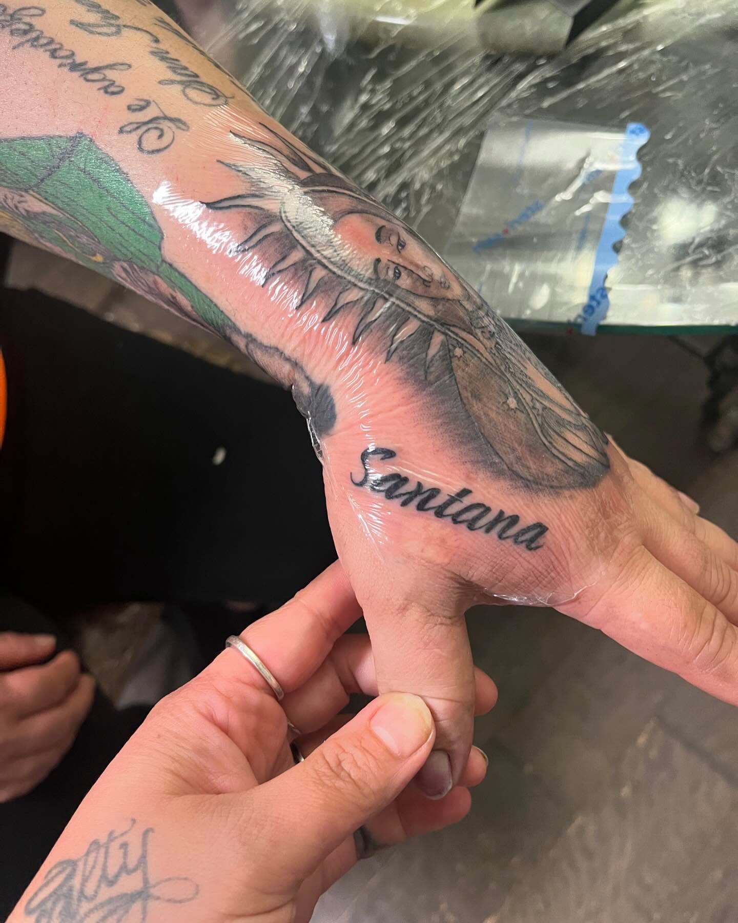 Religious figure realism tattoo on the hand by Anna DeLuna