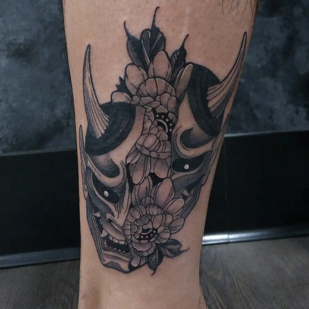 Swallows and flowers dotwork tattoo on the forearm by Cassandra Davis