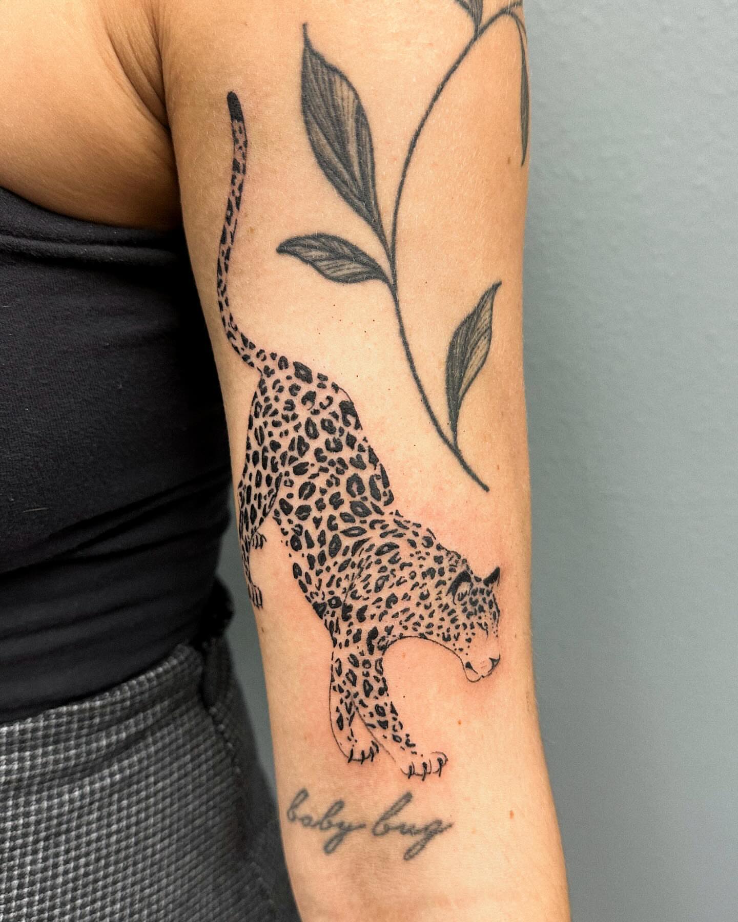 Leopard black and grey tattoo on the forearm by Portland Tattoo Artist