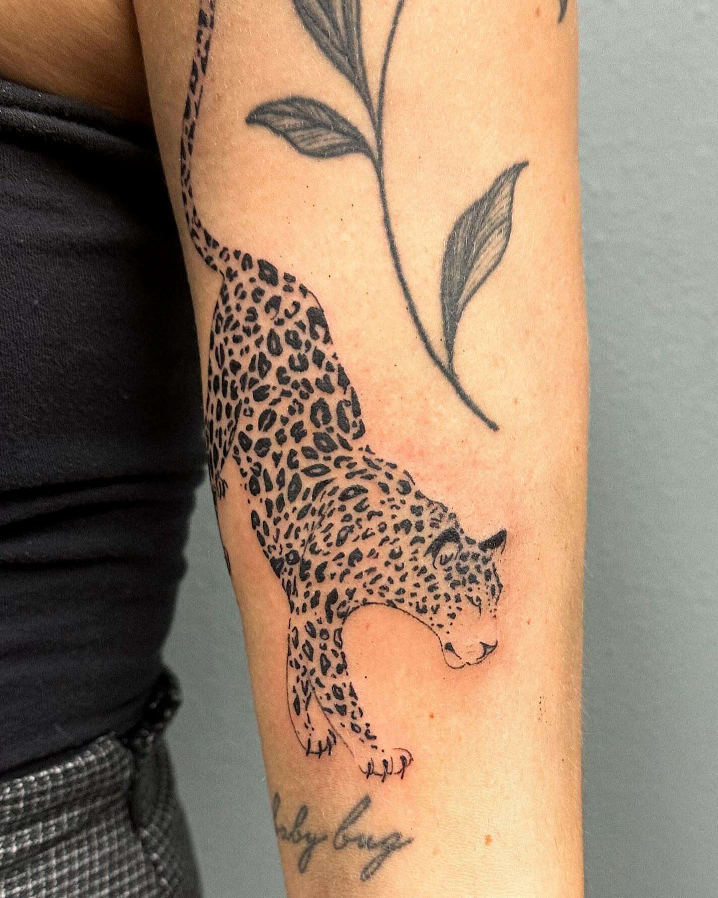 Leopard dotwork tattoo on the forearm by Portland Tattoo Artist
