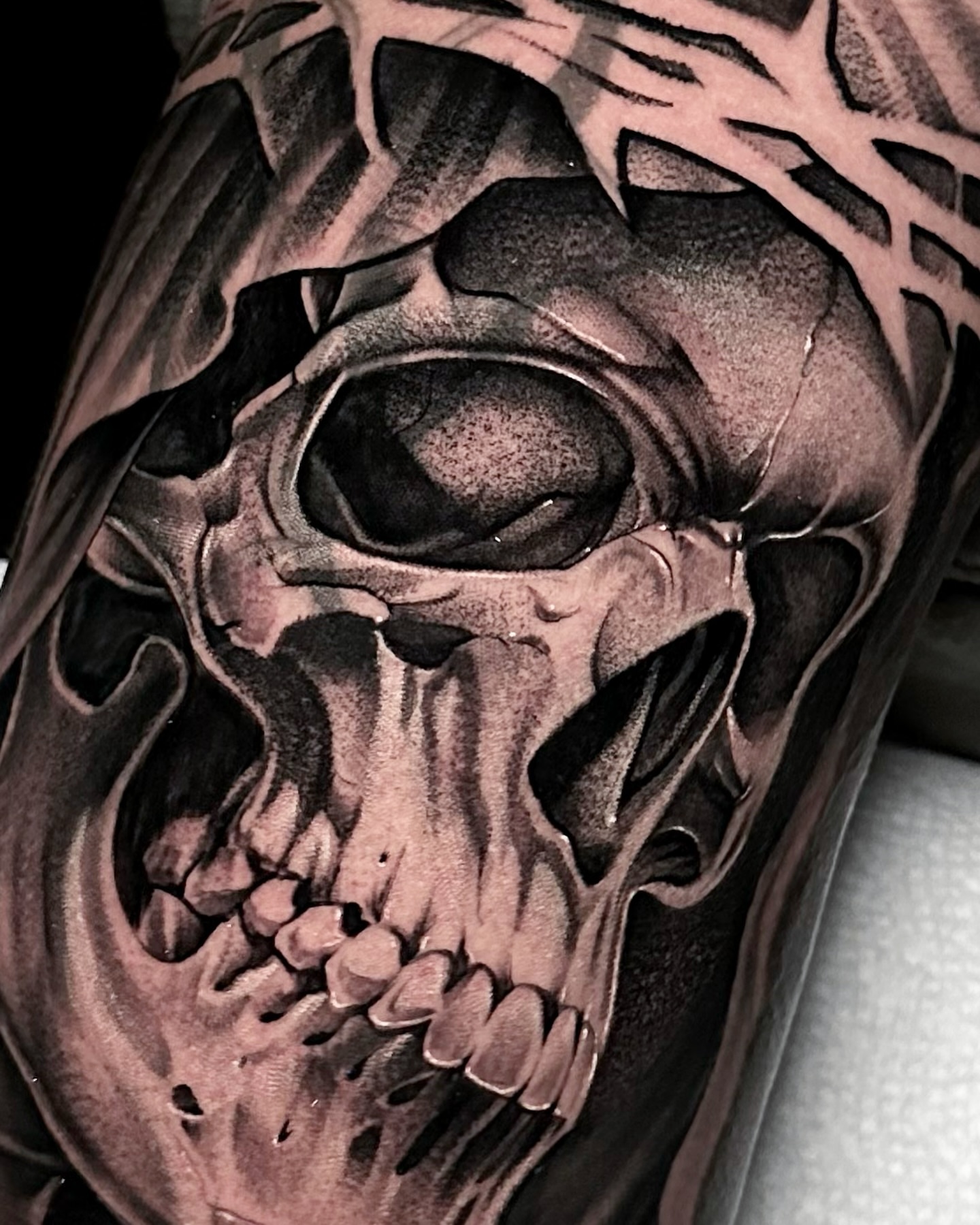 Skull realism tattoo on the forearm by Rawb