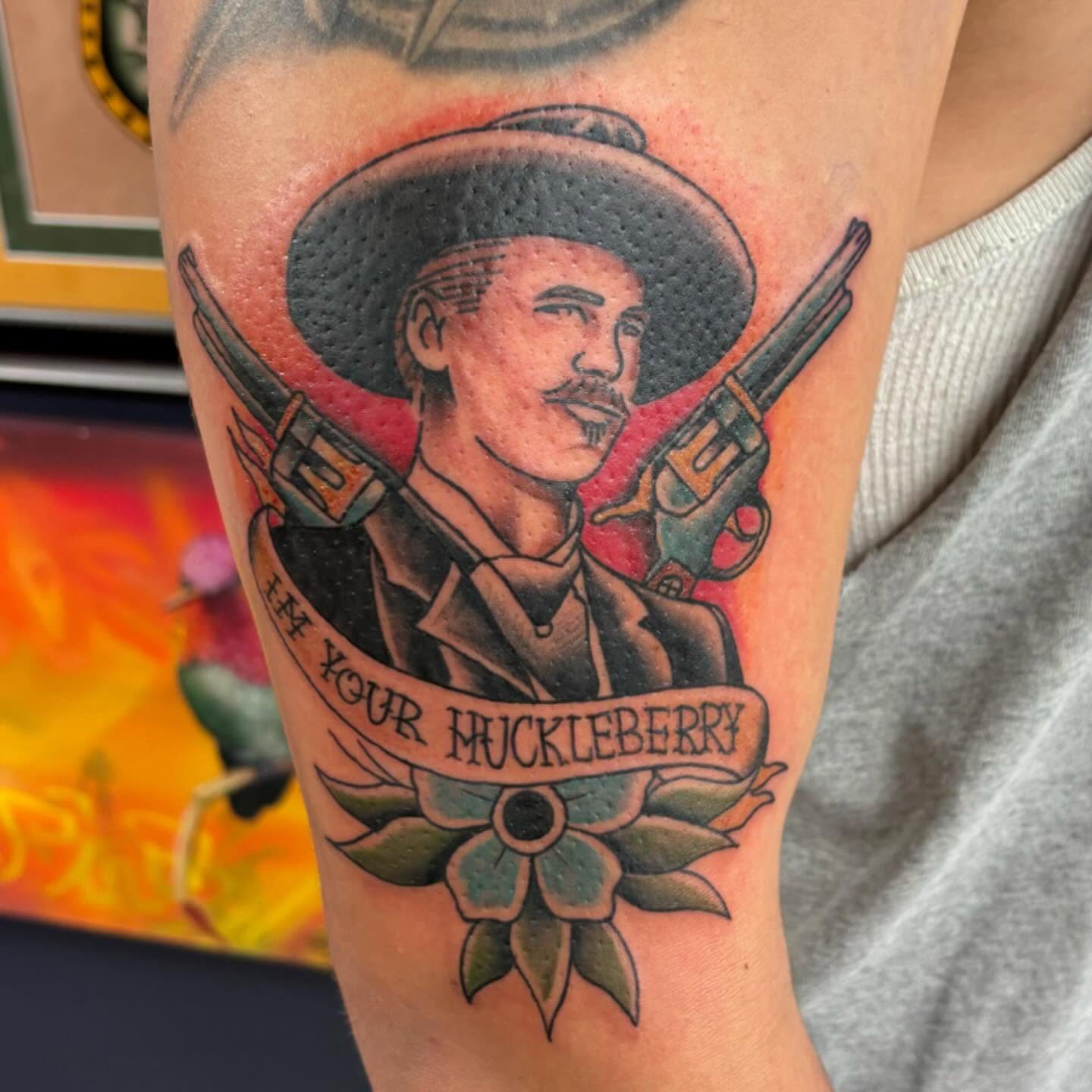 Cowboy with guns American traditional tattoo on the forearm by Amy Kolton
