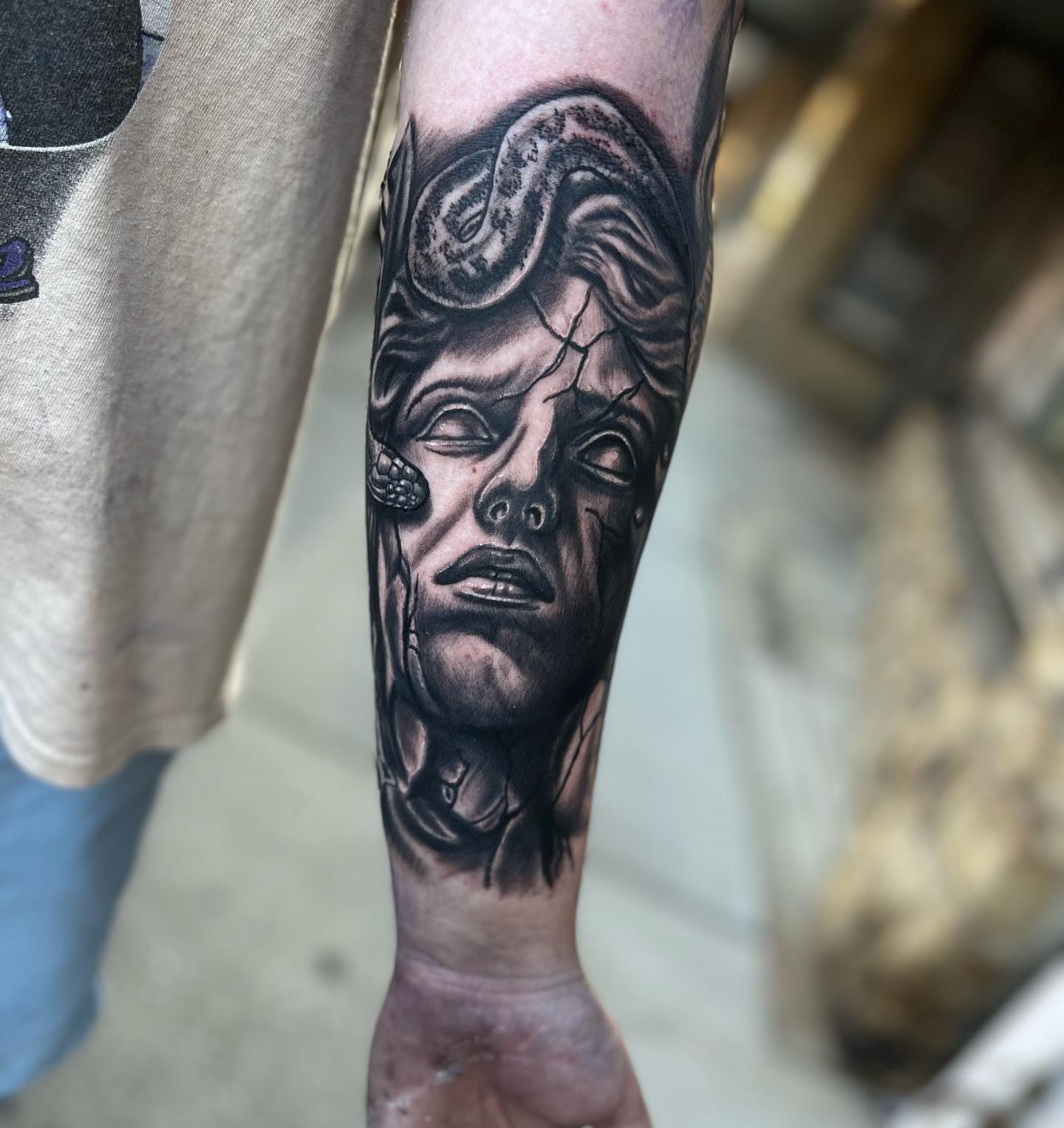 Tattoo by @burkes.body.graphic — black_and_grey, realism