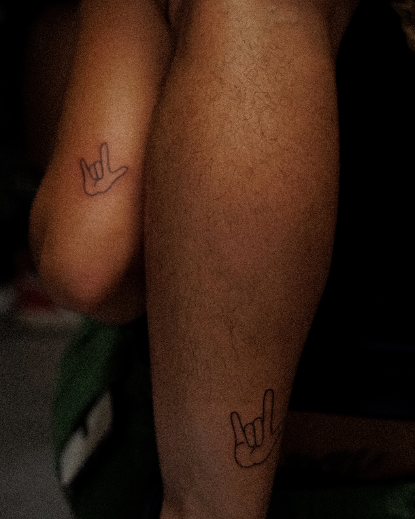 Hand gesture black and grey tattoo on the forearm by Katherin Plaza
