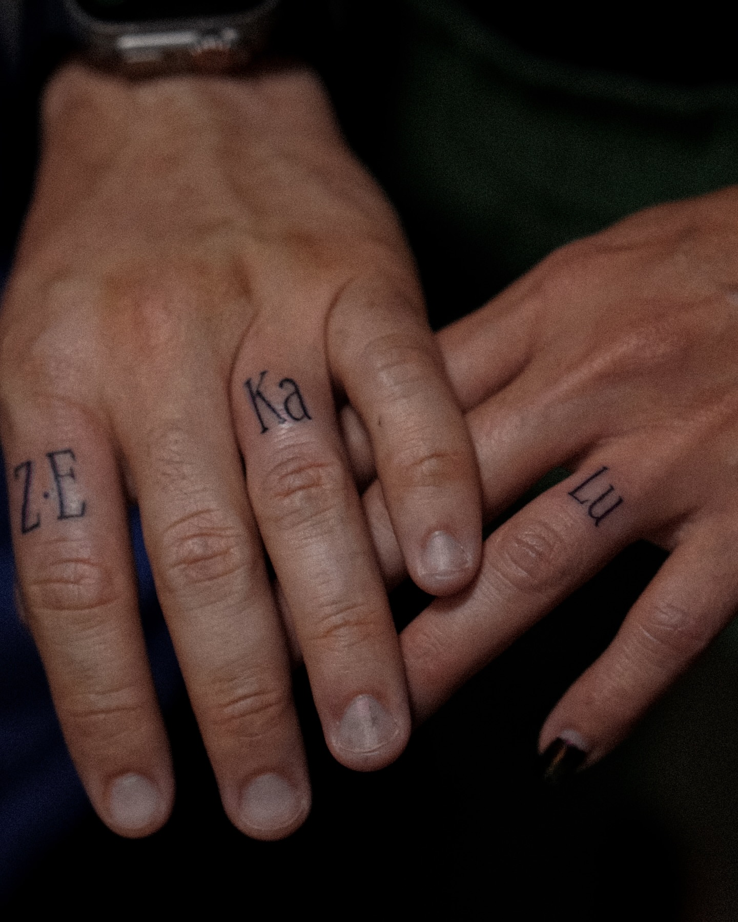 Initials lettering script tattoo on the hand by Katherin Plaza