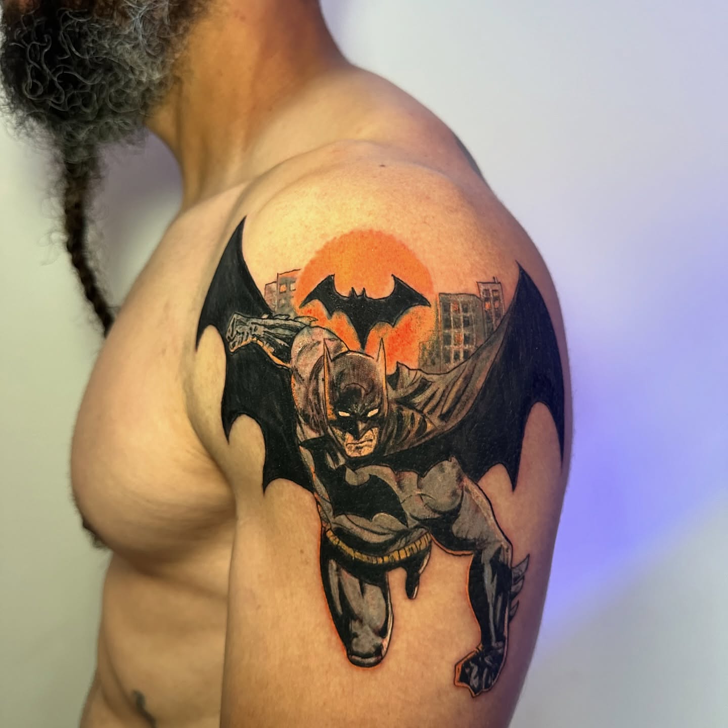 Batman realism tattoo on the shoulder by Héctor Agudelo