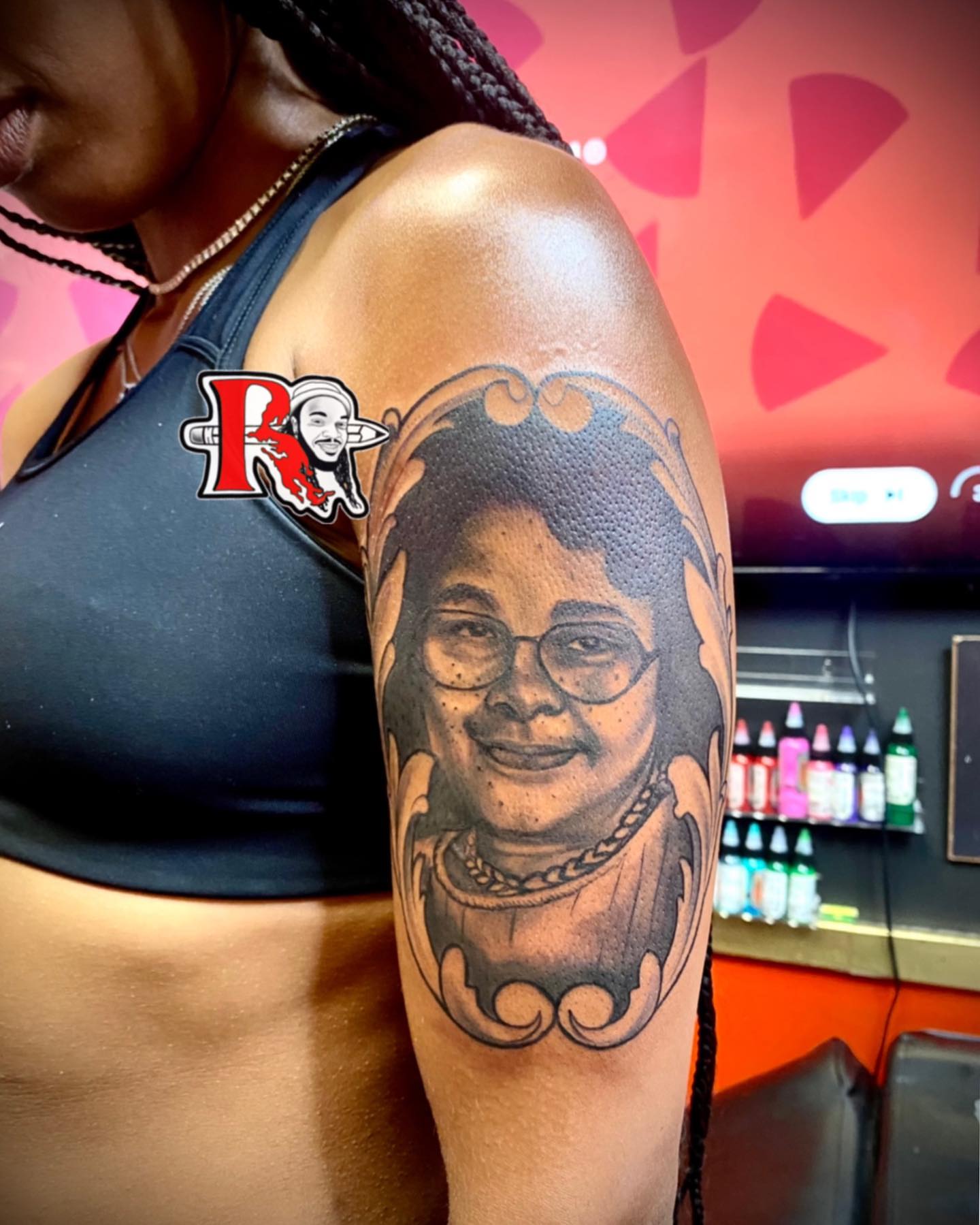 Portrait realism tattoo on the upper arm by Chicago Tattoo Artist