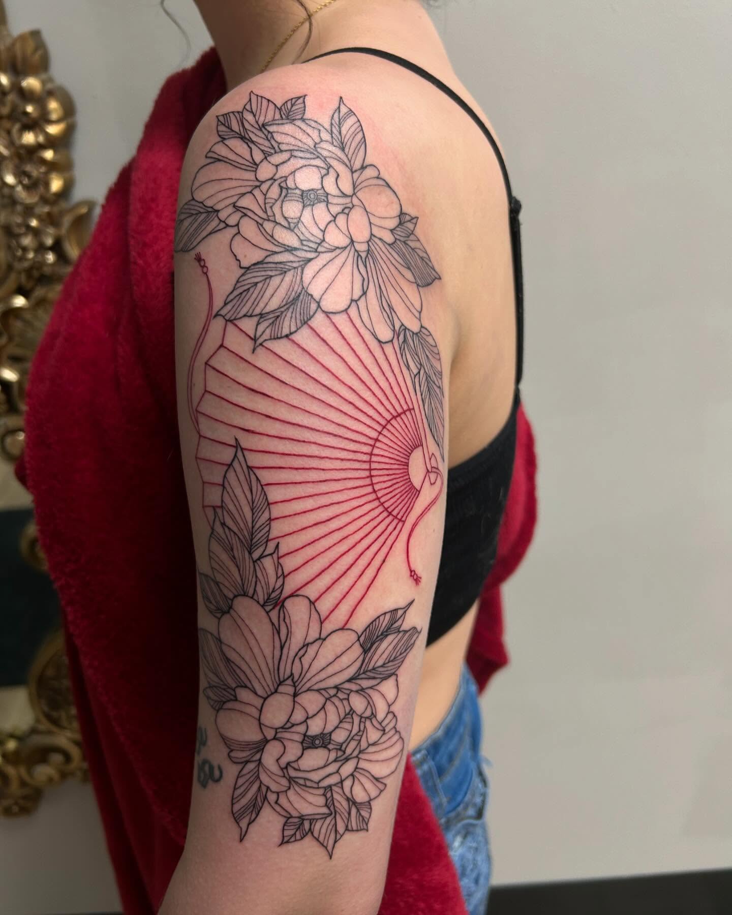 Floral arrangement fine line tattoo on the upper arm by 𝕯𝖆𝖓𝖎