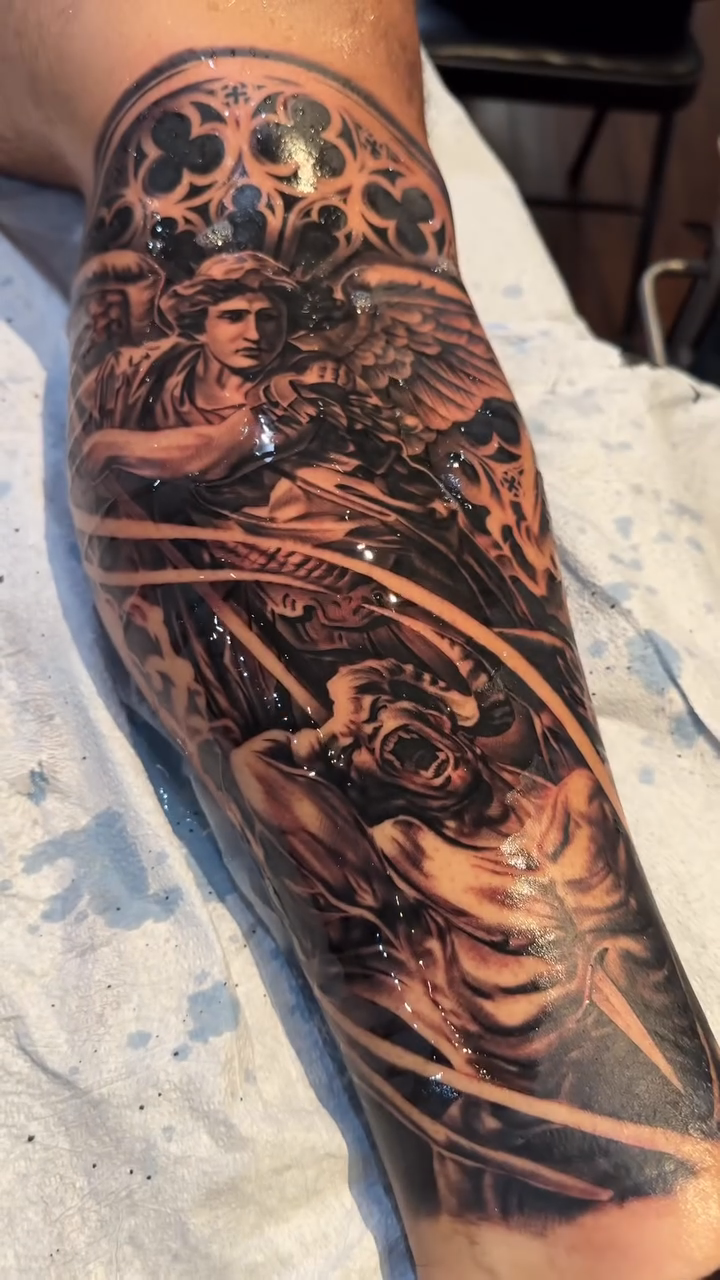 Angelic scene dark realism tattoo by 𝐉𝐨𝐧 𝐒𝐚𝐧𝐭𝐨𝐬