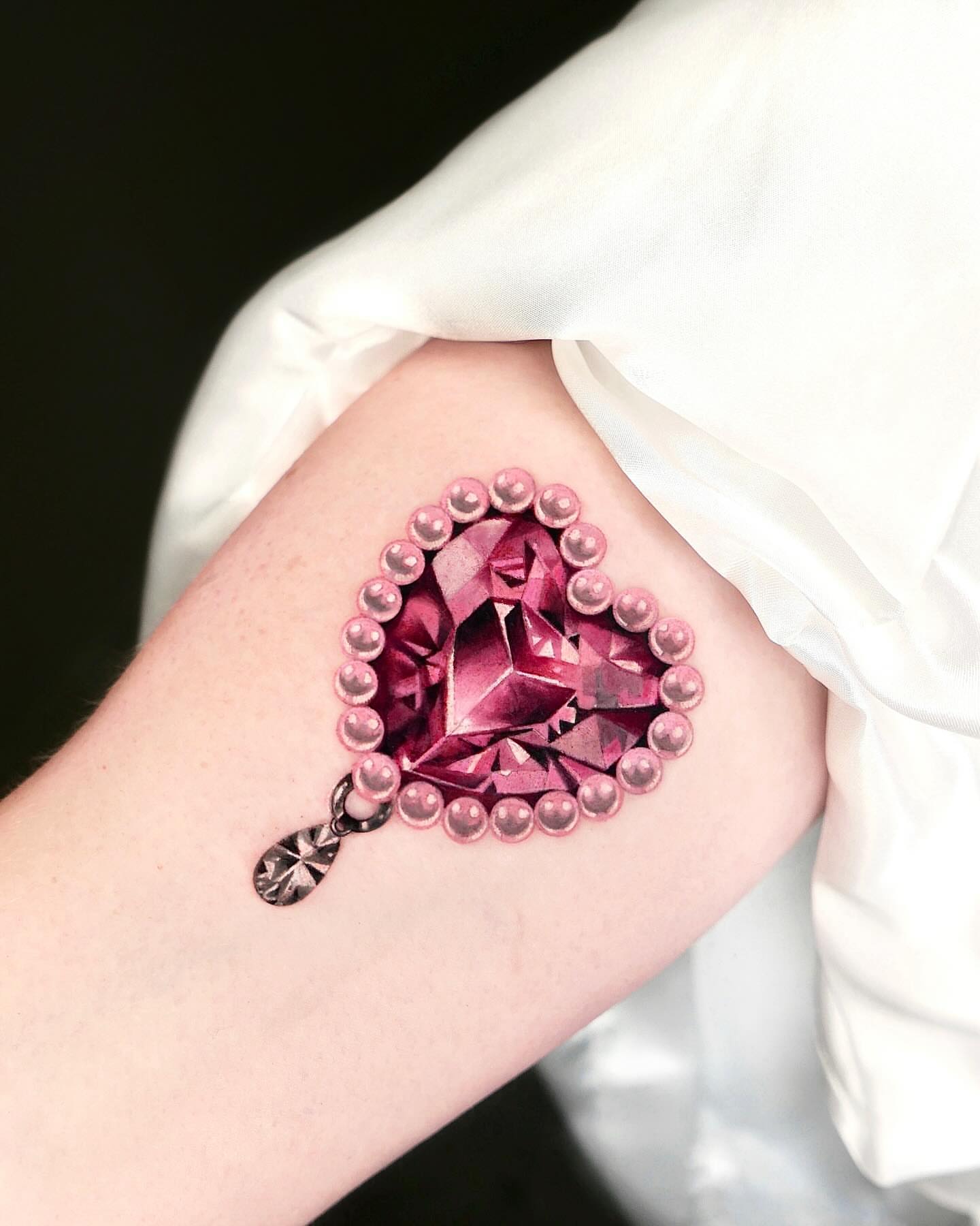 Gemstone realism tattoo on the forearm by Cyber sigil & ornamental tattoo π₯