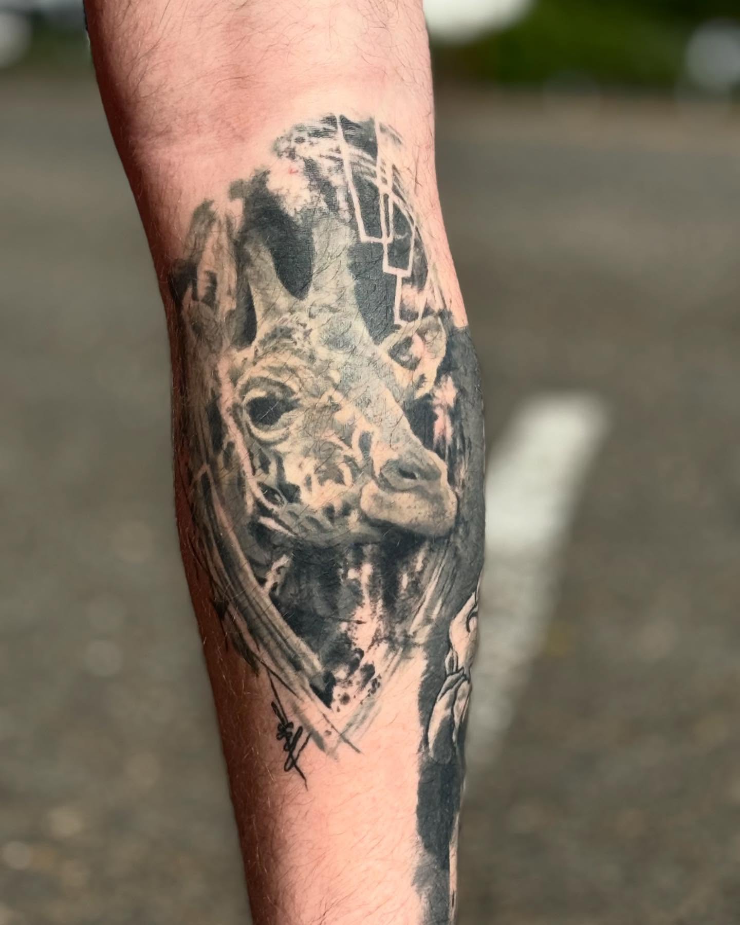 Tattoo by @tattoosbytravis — black_and_grey, realism