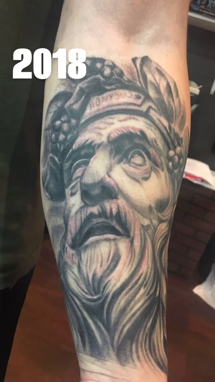 Greek god portrait realism tattoo by Krys King Tattoos
