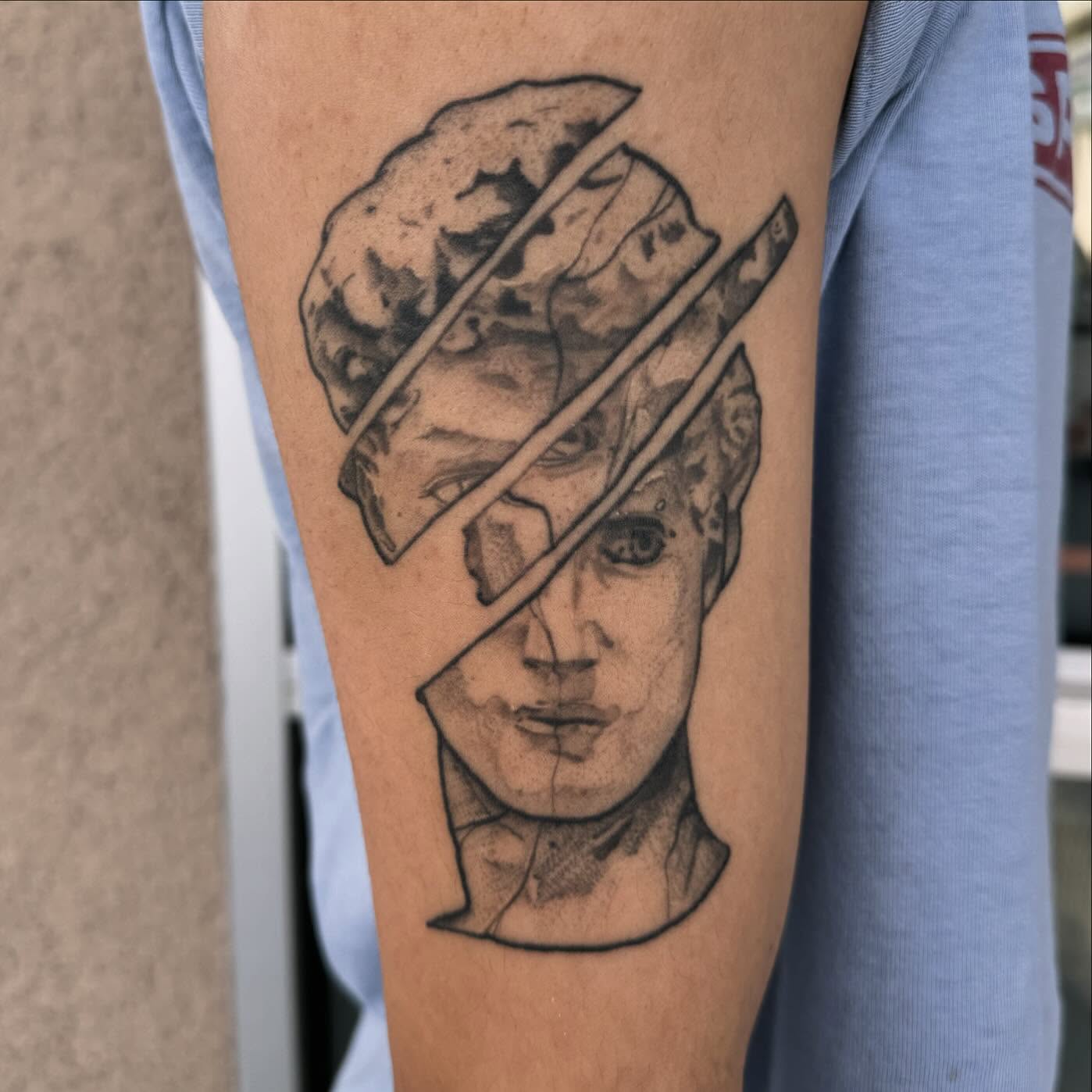 Abstract portrait realism tattoo on the forearm by Kyle Haitch, Las Vegas, Nevada