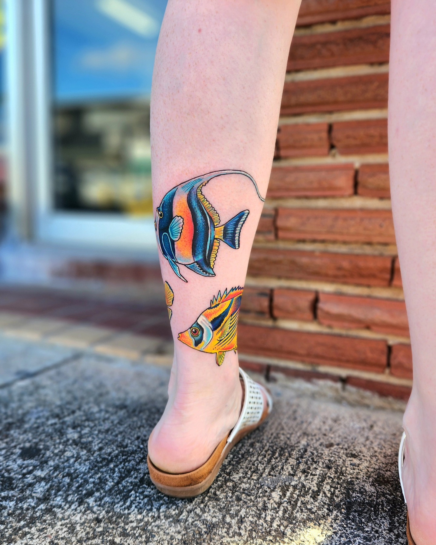 Fish realism tattoo on the leg by Elizabeth Stepp