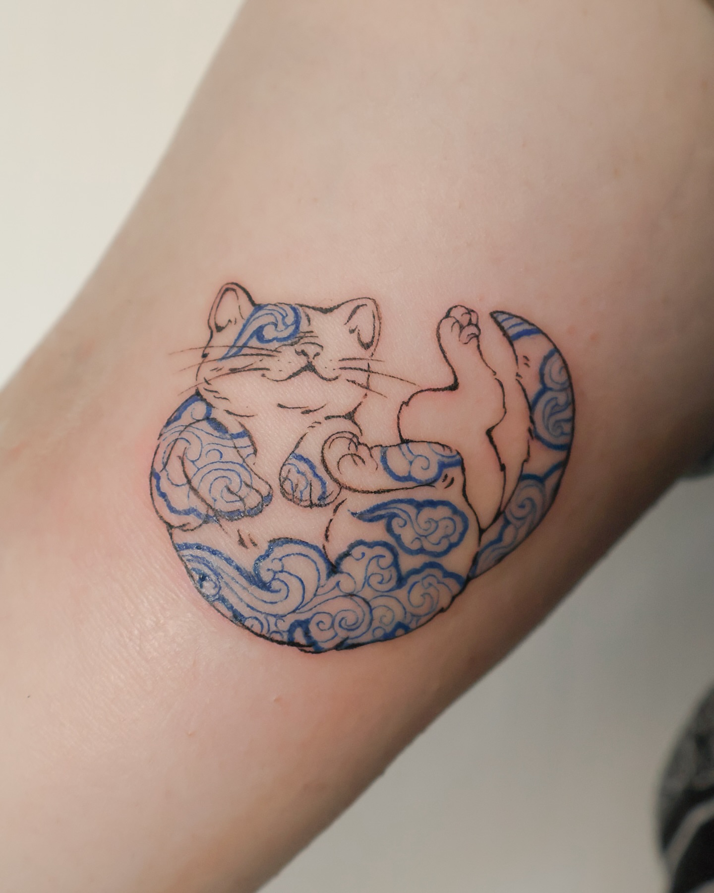 Cat japanese irezumi tattoo on the forearm by Grace Zarmina Hessam