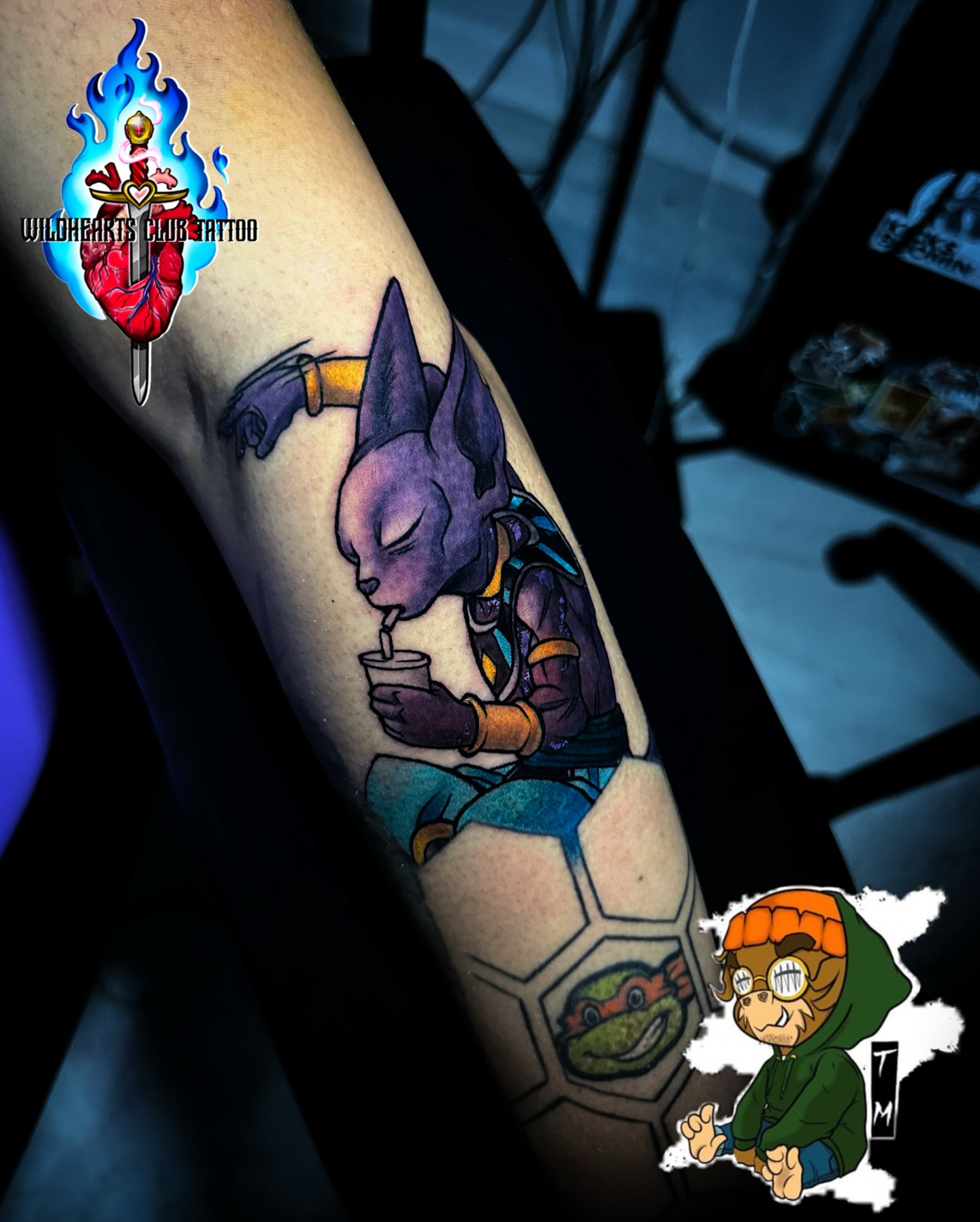 Character drinking anime tattoo on the forearm by Davone Joyner, Richmond, Virginia