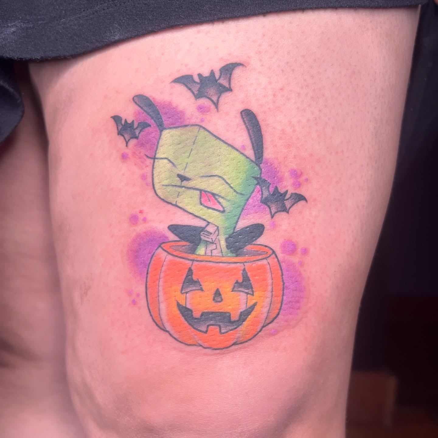 Pumpkin monster new school tattoo on the thigh by Tattoo & Body Artist, Gastonia, North Carolina