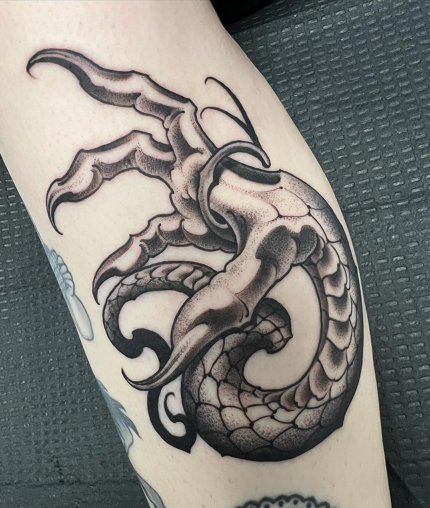Dragon black and grey tattoo on the forearm by Byron Winkelman, Gilbert, Arizona