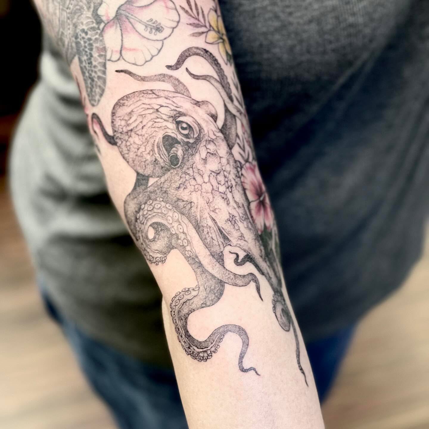 Octopus black and grey tattoo on the forearm by Katie Stacy