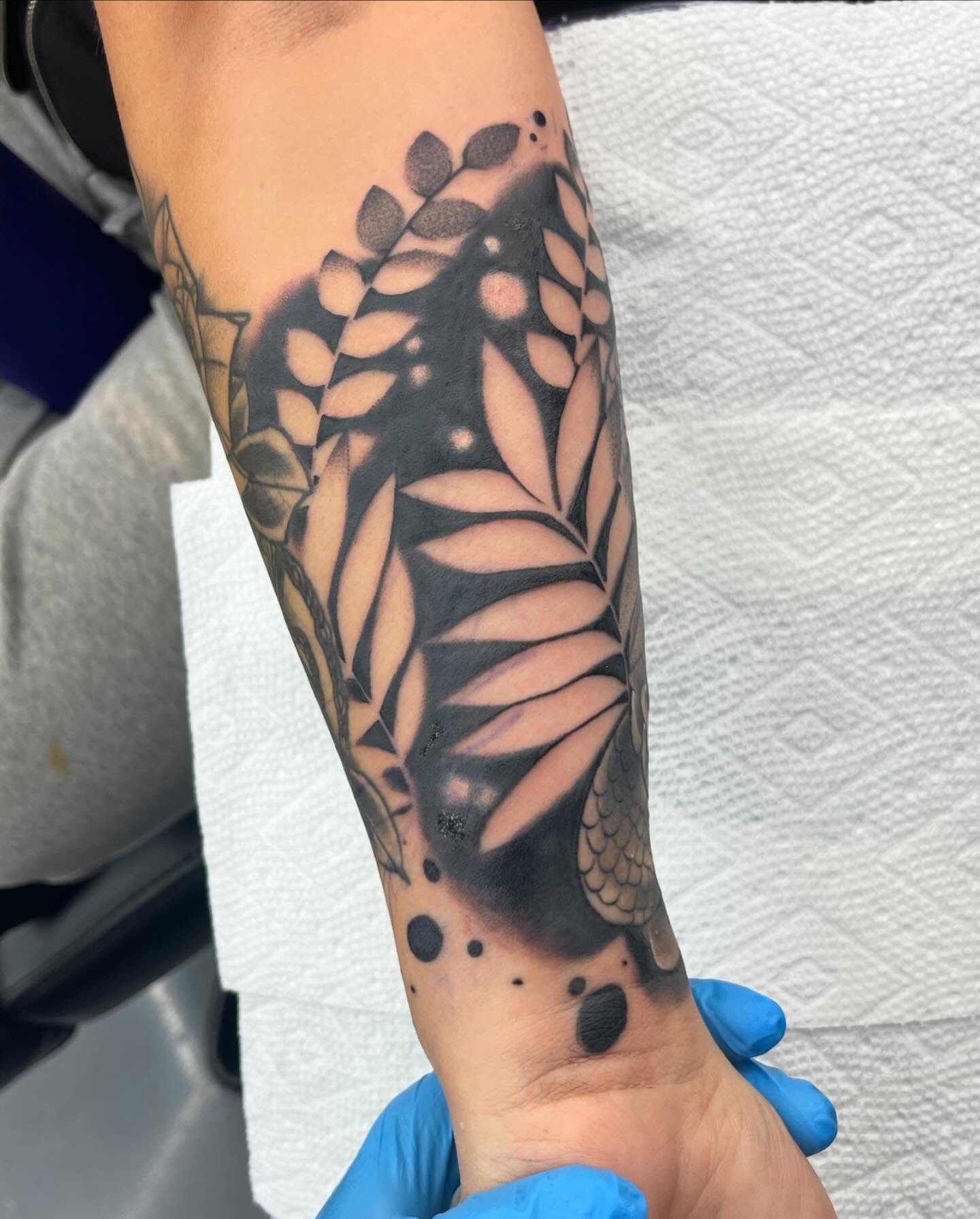 Monarch butterfly dotwork tattoo on the forearm by Autumn Fulford