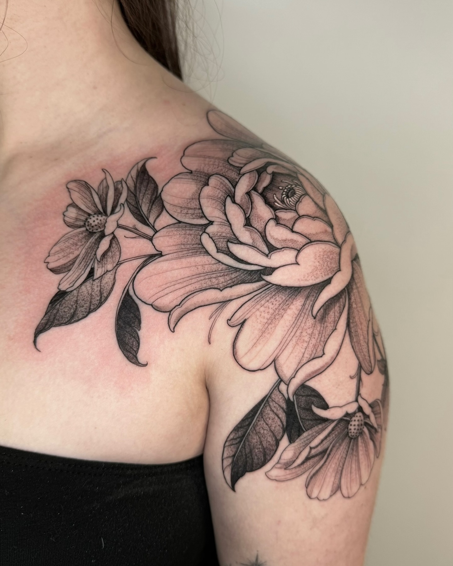 Peony and dahlia realism tattoo on the shoulder by Las Vegas Tattoo Artist