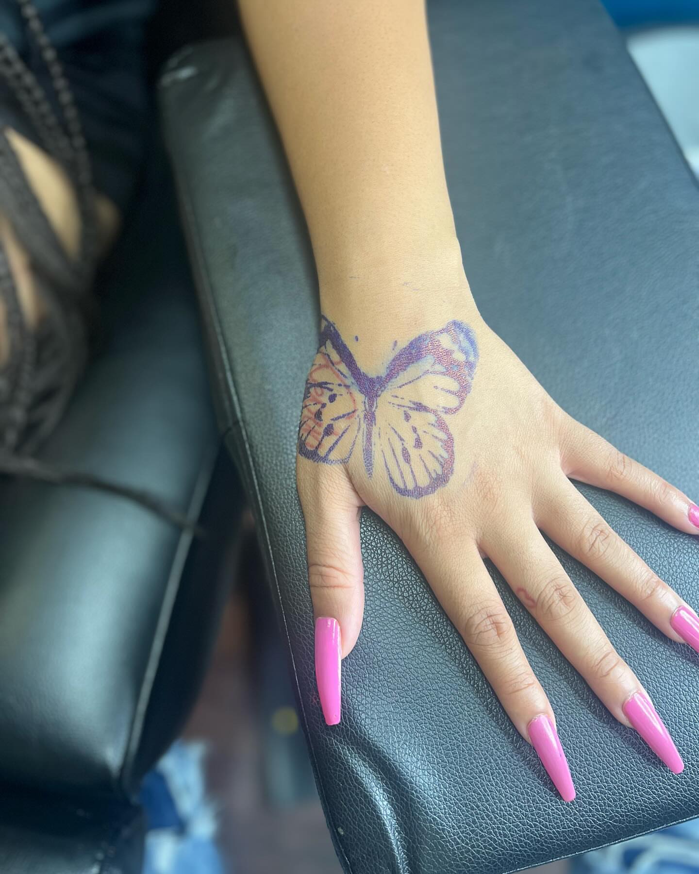 Butterfly dotwork tattoo on the hand by Glass Inkk