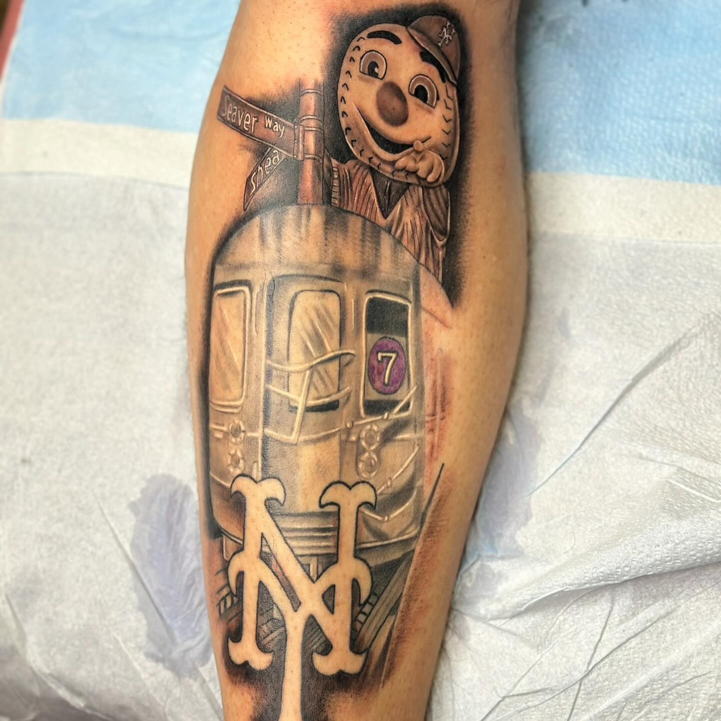 Train and Thomas the Tank Engine realism tattoo on the forearm by Diana Kunz