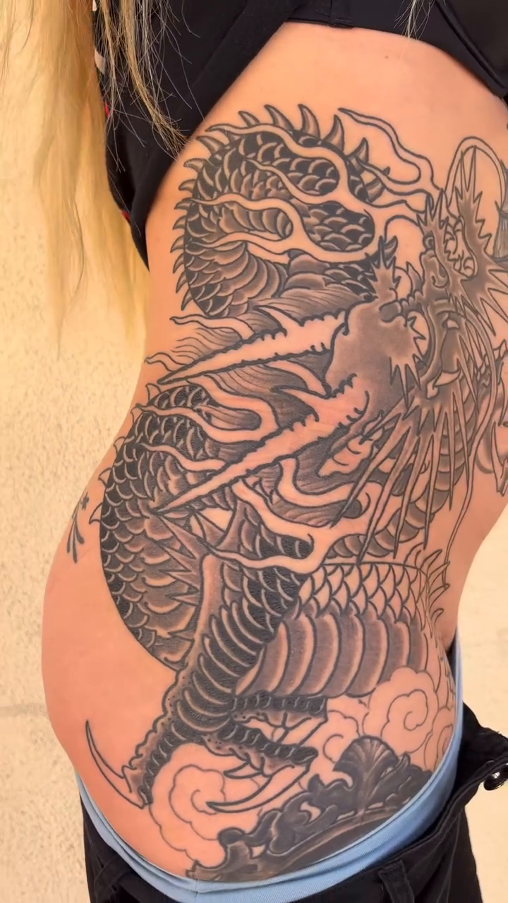 Dragon with clouds and waves japanese irezumi tattoo by Kayle Leogrande