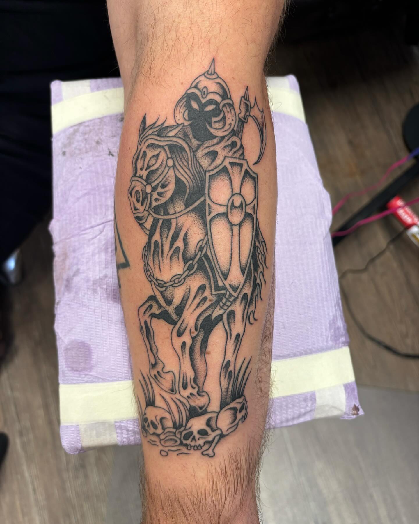Horseman and horse black and grey tattoo on the forearm by Brayden P Tattoo