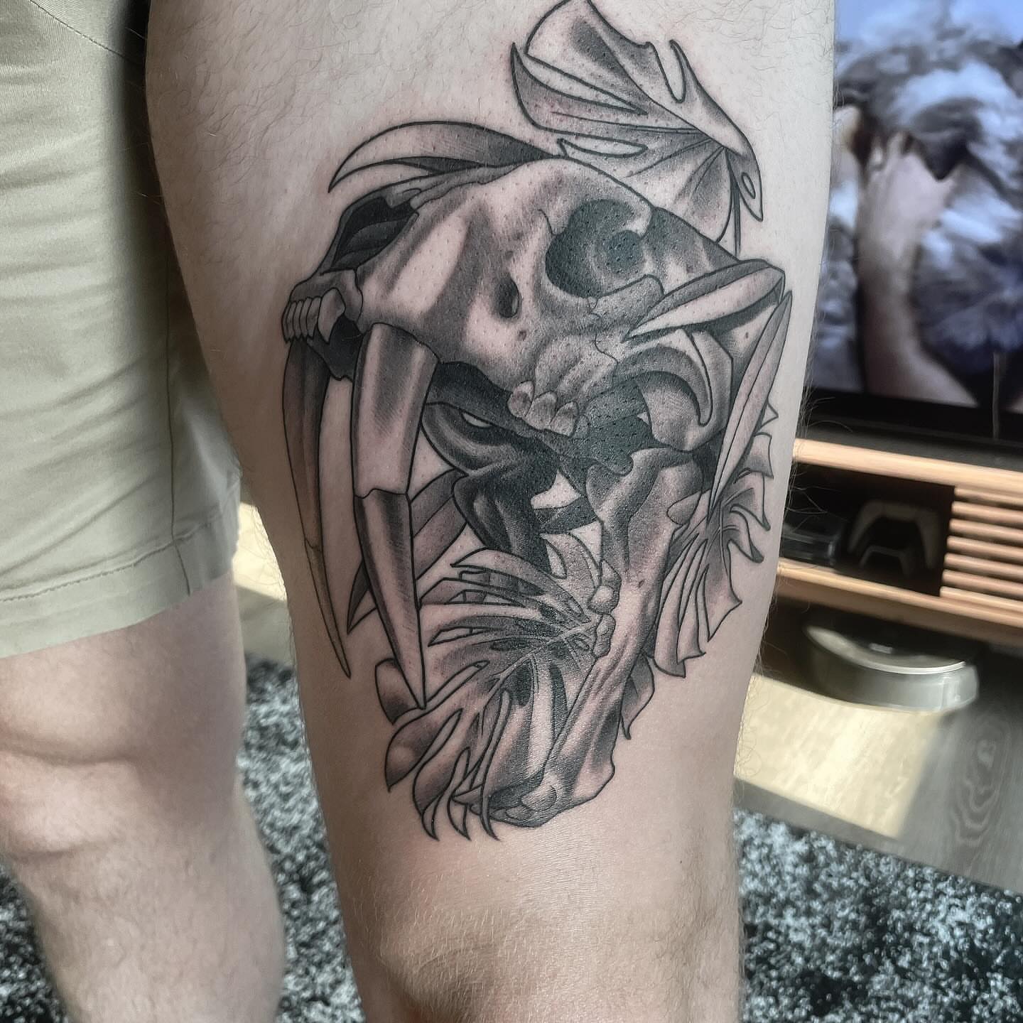 Tattoo by @booradleey — black_and_grey, realism