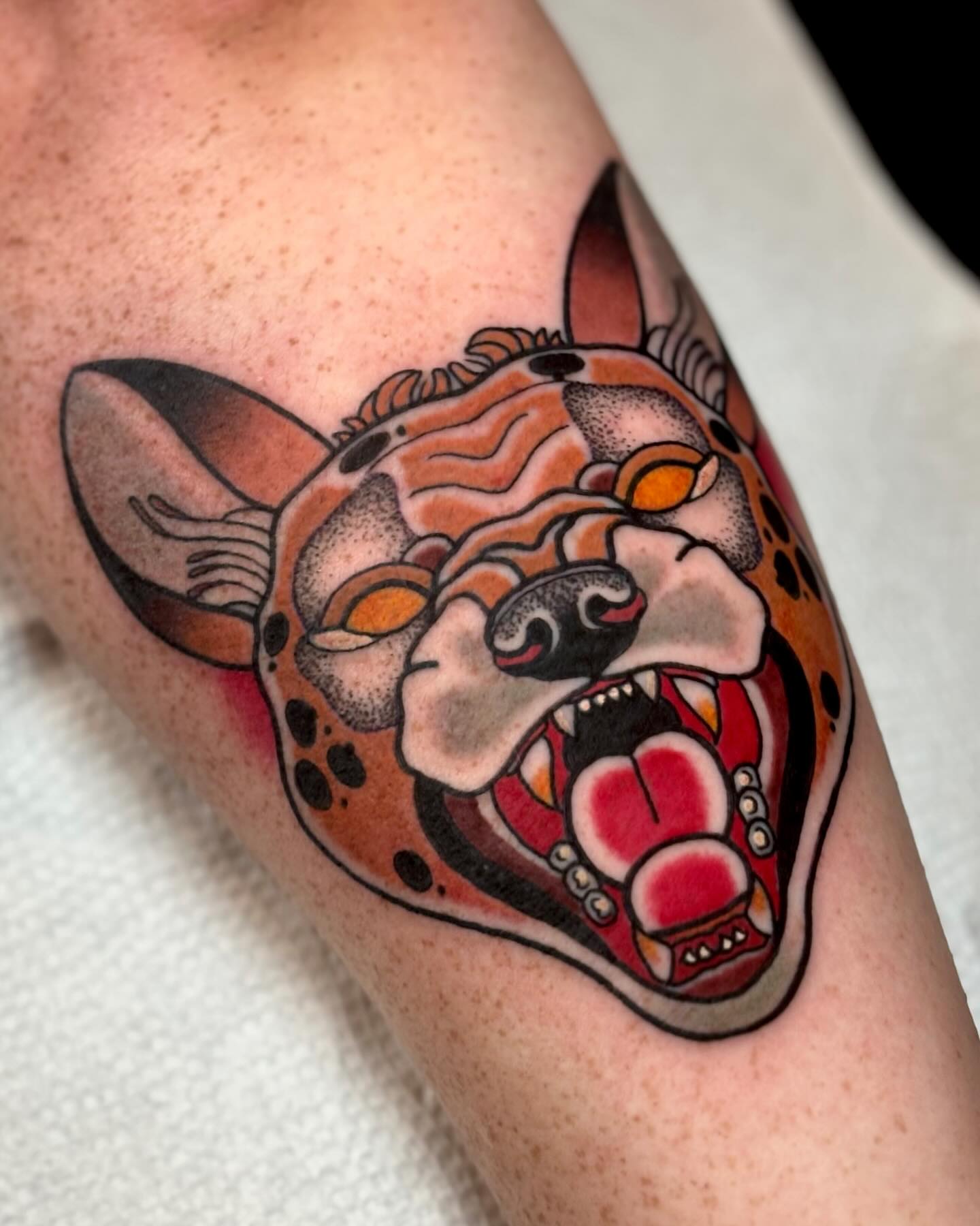 Jaguar American traditional tattoo on the forearm by Todd Showdown