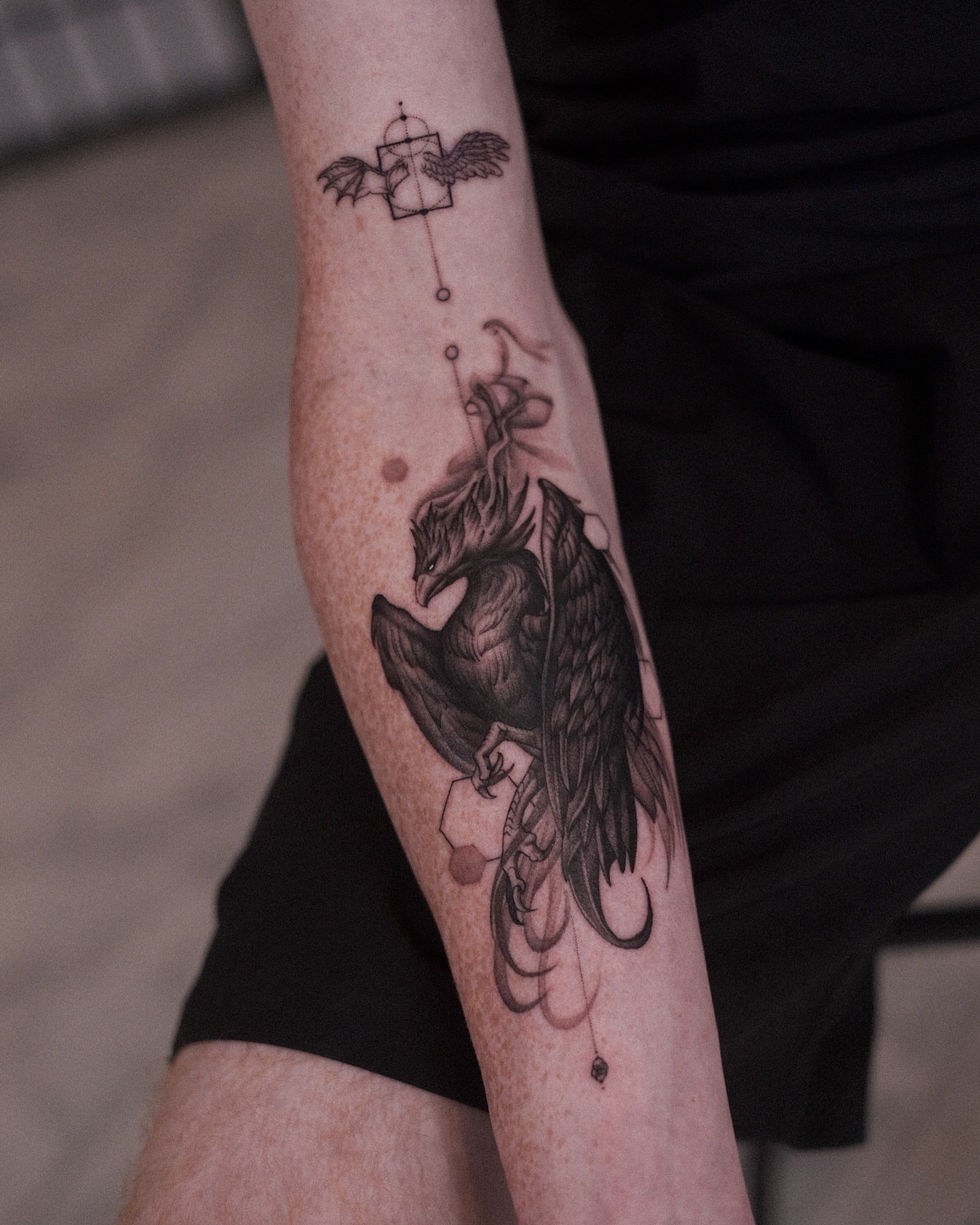 Winged dragon dotwork tattoo on the forearm by Oleksandr Moroz