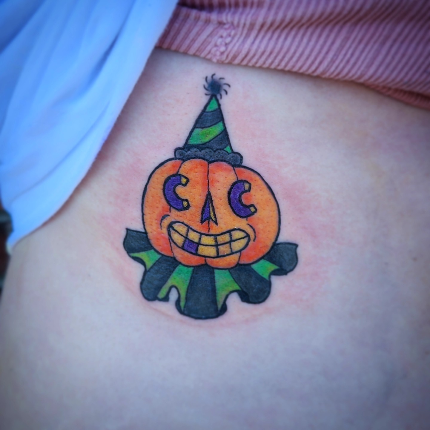Pumpkin American traditional tattoo on the ribs by Jennalea
