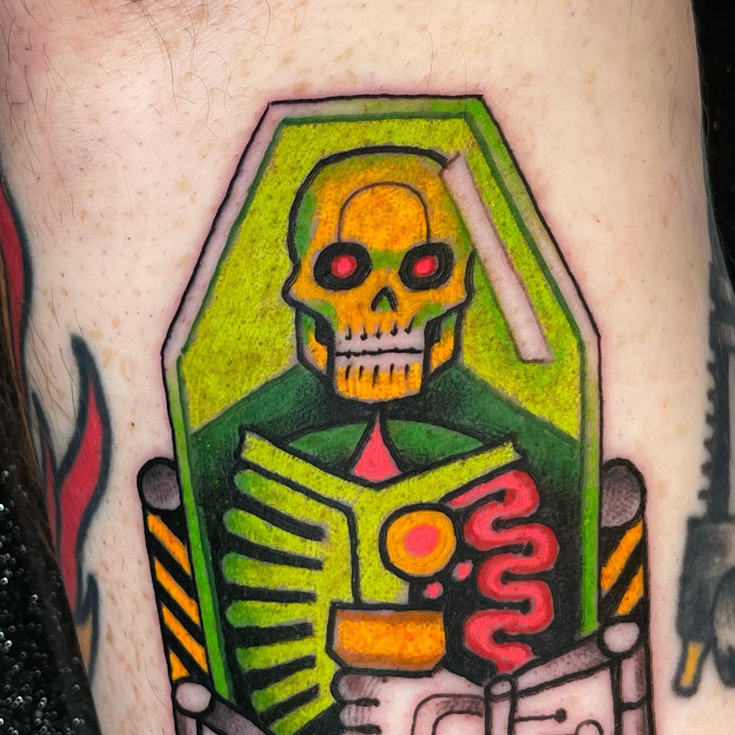 Skull in coffin American traditional tattoo on the thigh by Ian Bederman, Austin, Texas