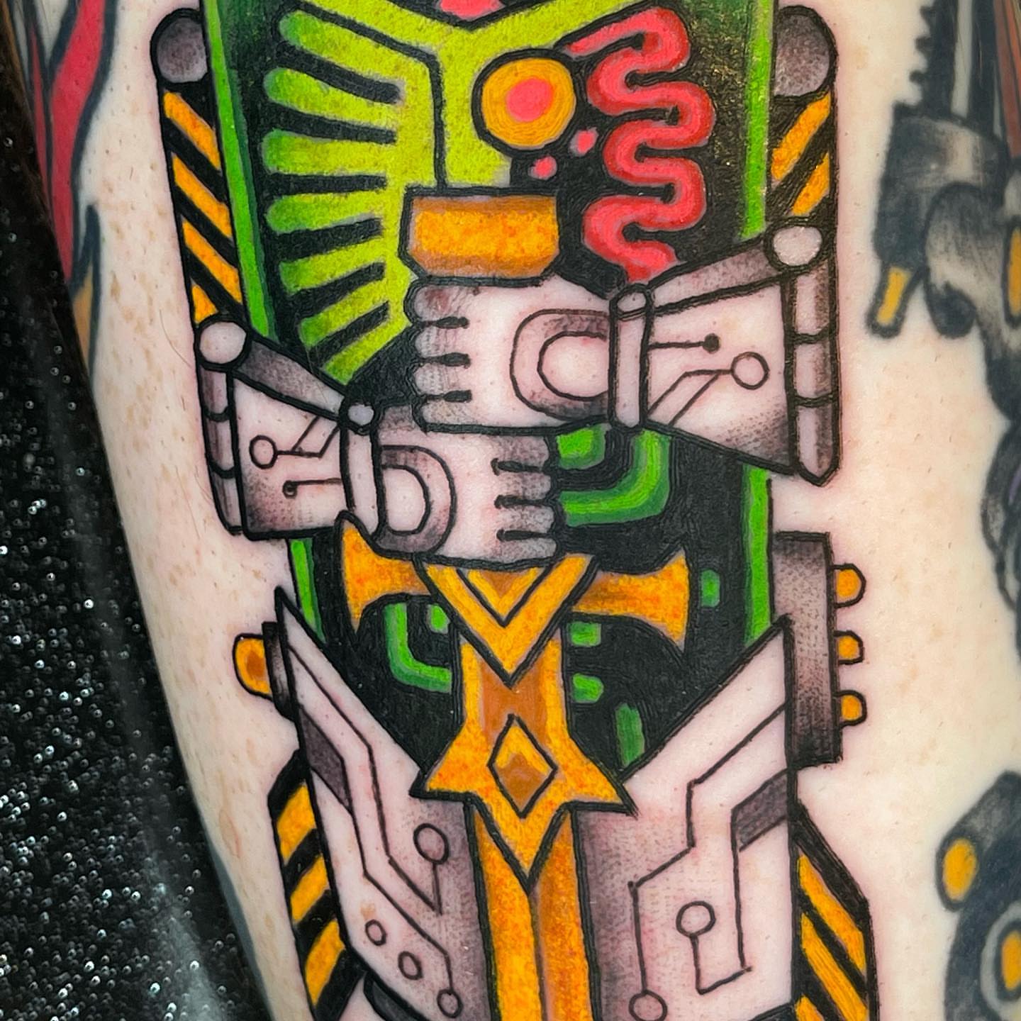 Robot geometric tattoo on the forearm by Ian Bederman, Austin, Texas