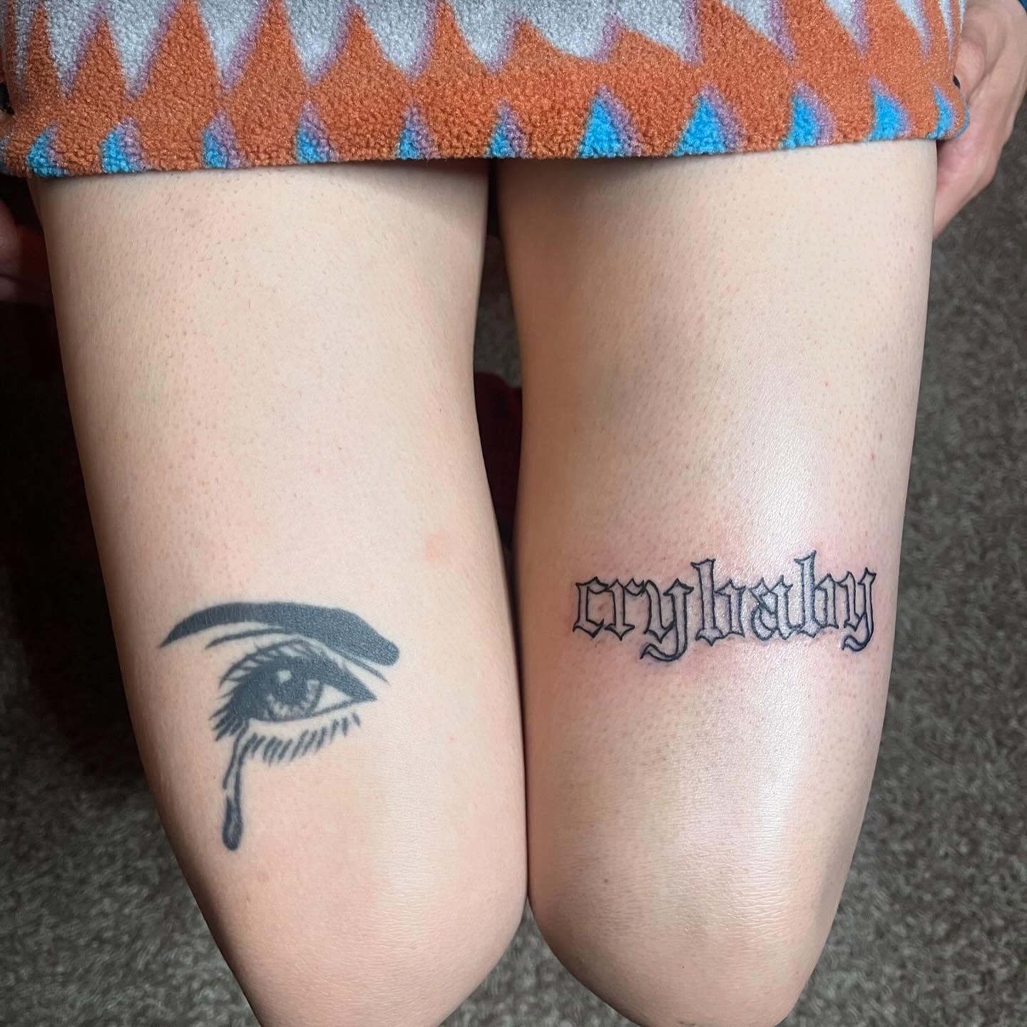 Eye with tear black and grey tattoo on the leg by Danny Garcia