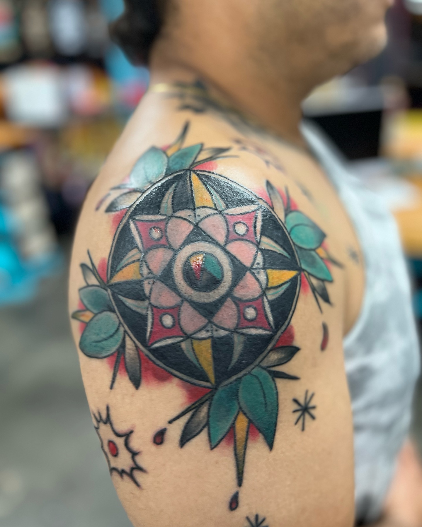 Geometric mandala geometric tattoo on the shoulder by Ashley Camp