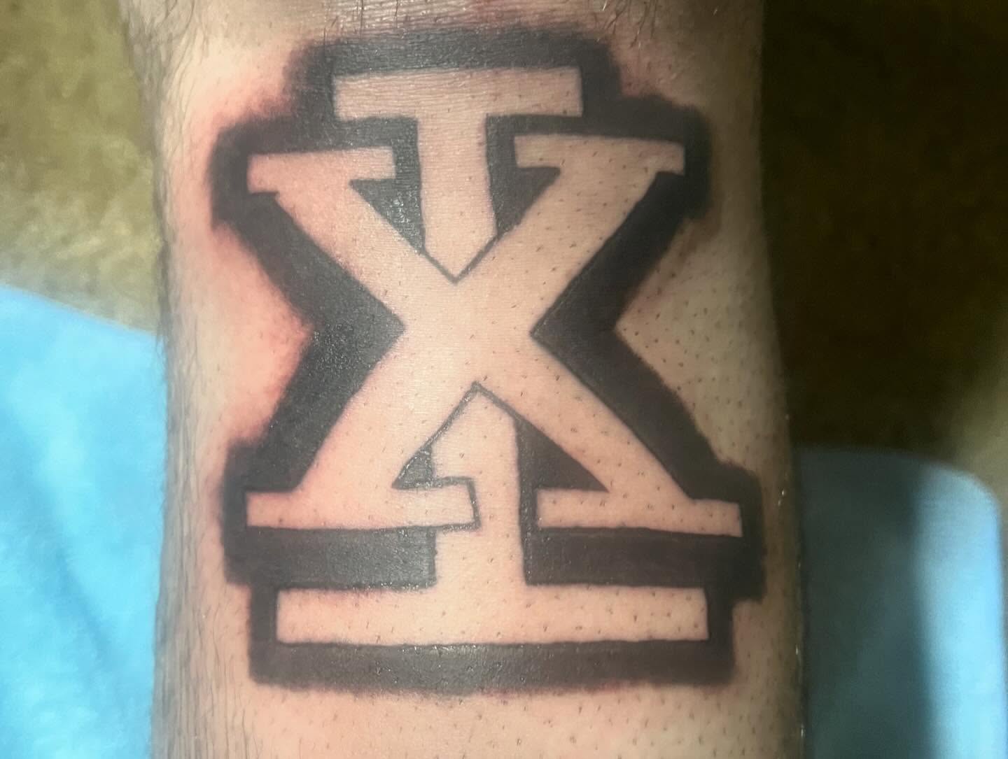 Cross geometric tattoo on the forearm by Ink_ Hustle36