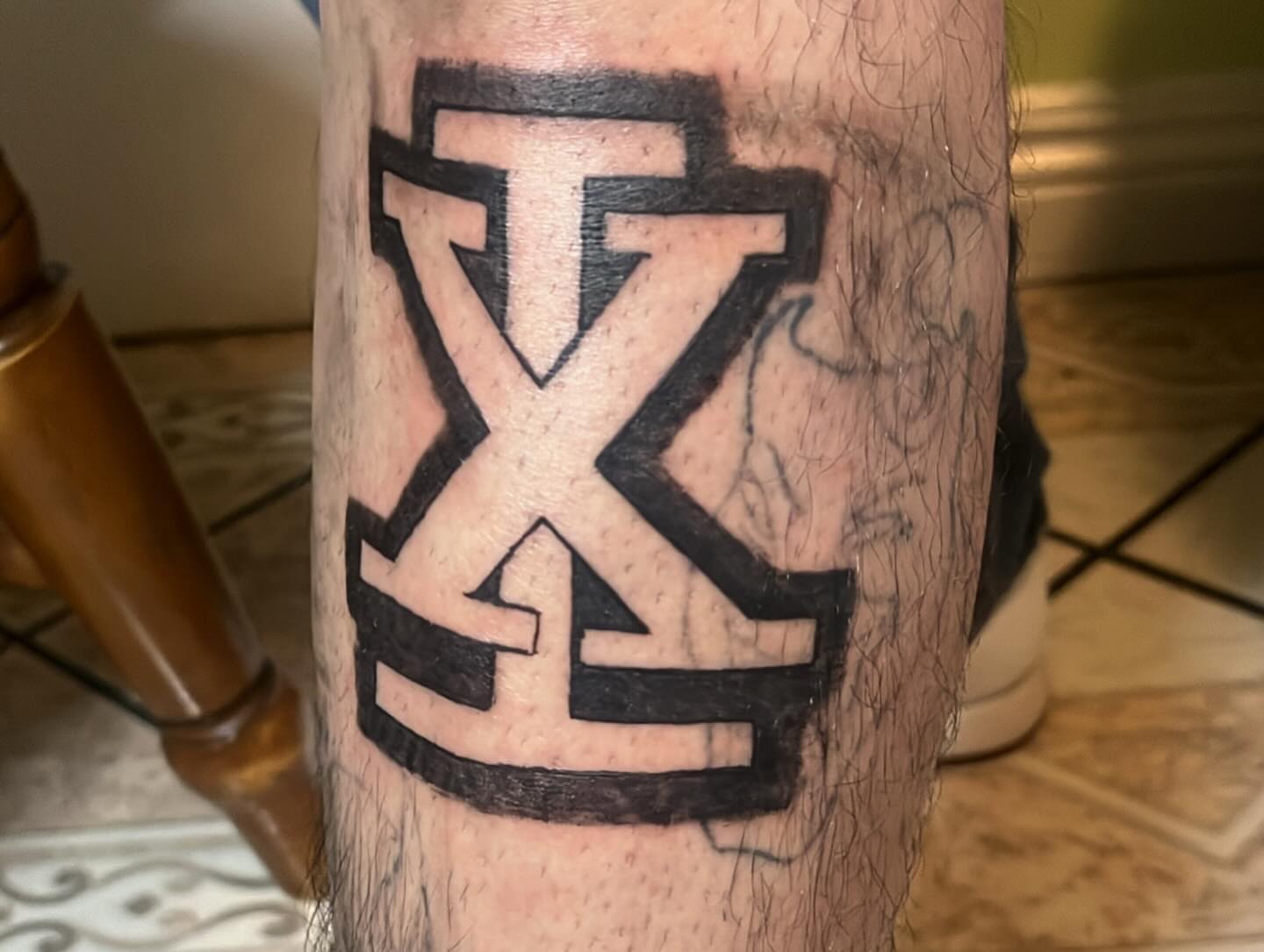 Cross geometric tattoo on the forearm by Ink_ Hustle36