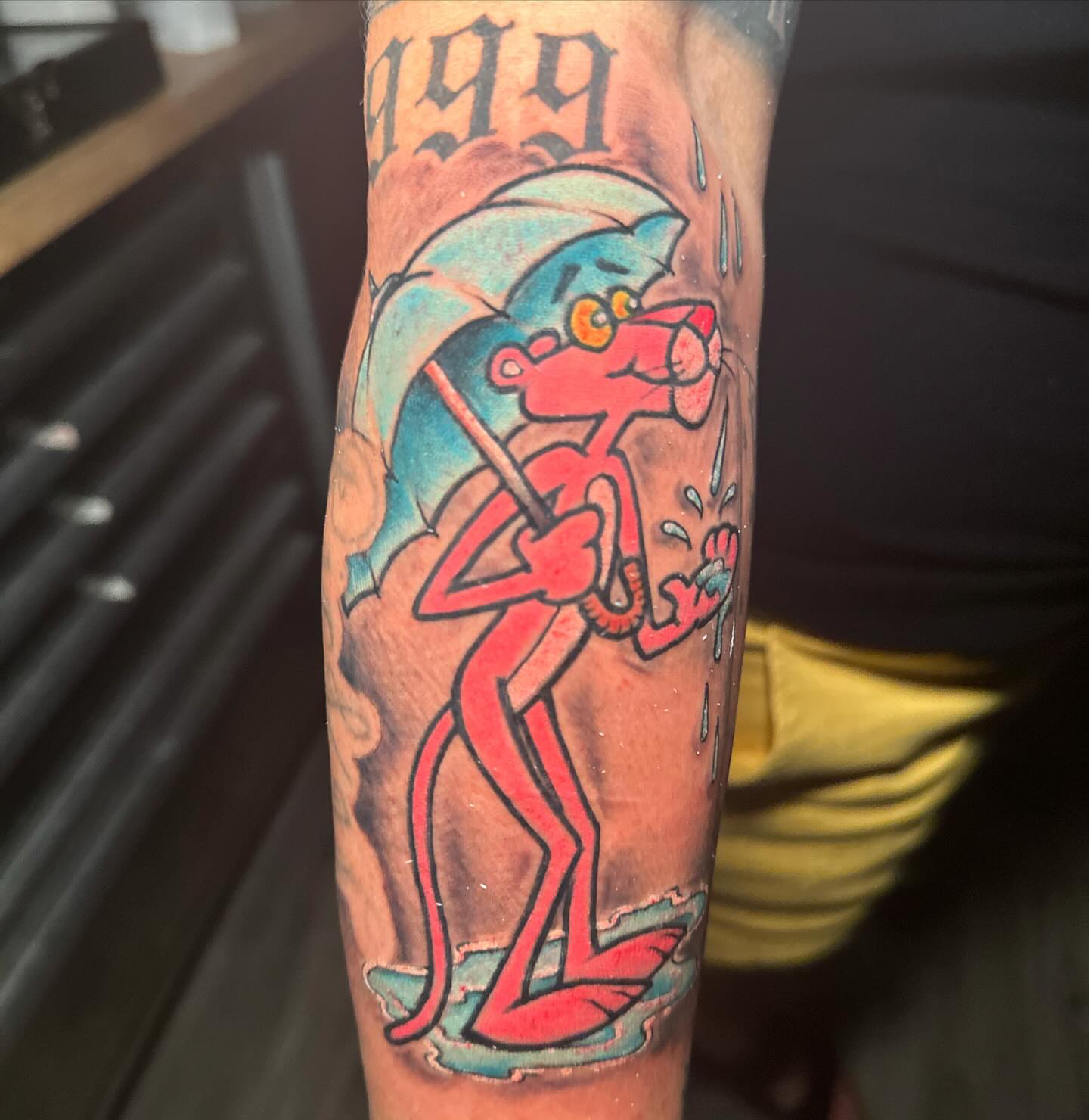 Pink panther American traditional tattoo on the forearm by Edward Choat