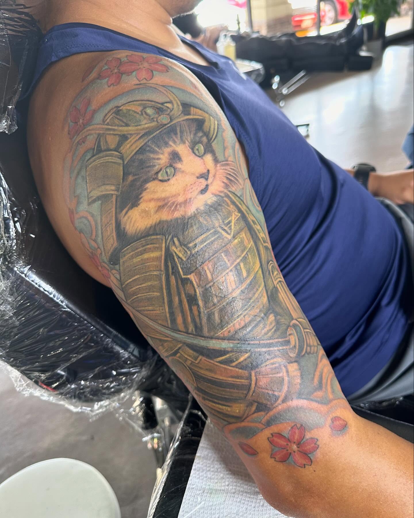 Cat in samurai armor realism tattoo on the forearm by Cameron Hobbs, Woodbridge, Virginia