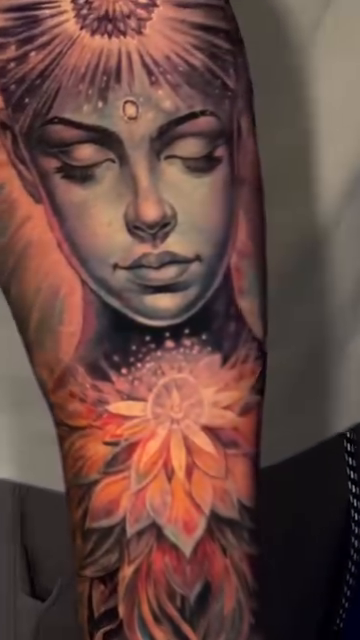 Woman meditating with cosmic background realism tattoo by James Moyer