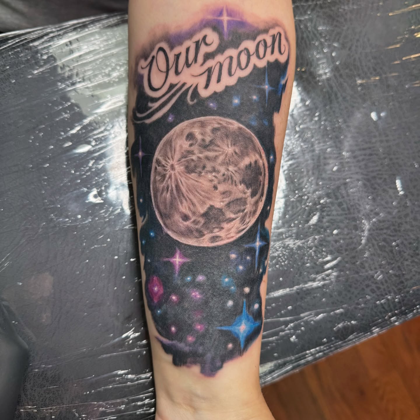 Moon realism tattoo on the forearm by Hori Shit